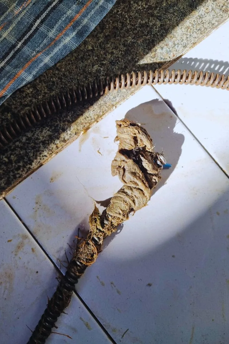 Desentupimento de cano entupido